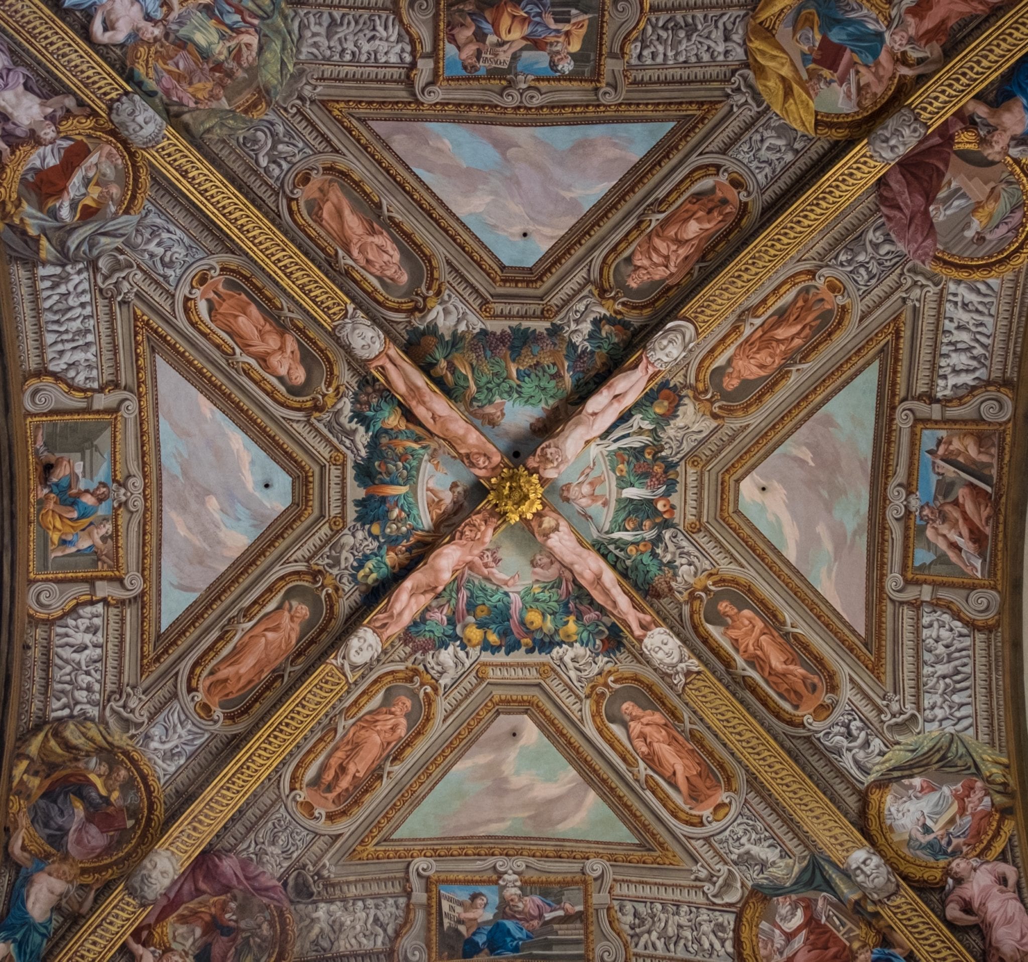 A square image of Parma's cathedral ceiling divided into sections shaped like an X, paintings on the ceiling.