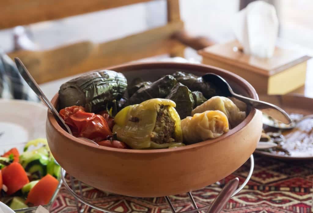 A clay pot filled with dolma, Armenian stuffed vegetables.