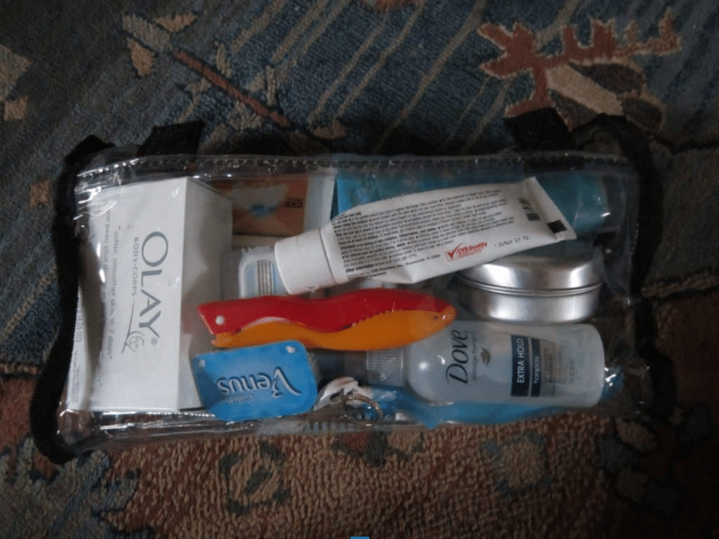 Toiletries A toiletry bag filled with soap, toothbrush, razors, and more.