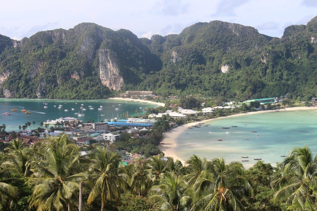 A view over Koh Phi Phi and its best hotels, a skinny piece of land in the middle that widens into two cliff-topped pieces of land.
