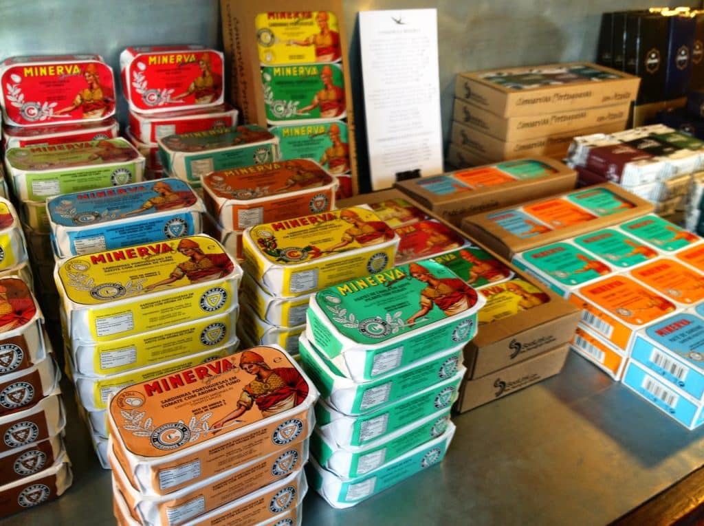 Stacks of brightly colored sardine tins