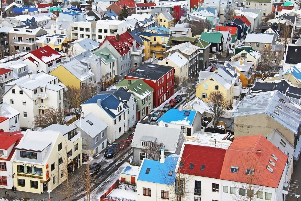 Colorful roofs and houses on the gridded streets of Reykjavik, Iceland, shot from above.