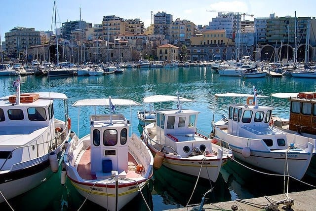 Many boats in a harbor.