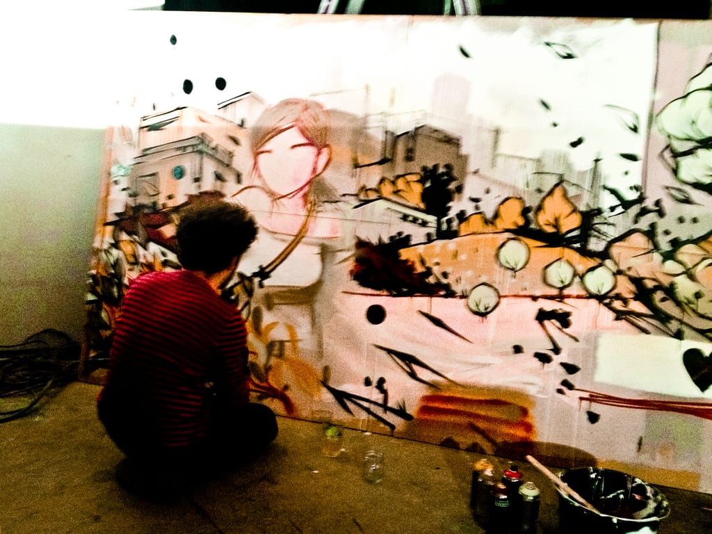 Artist at work at Generator Hostel