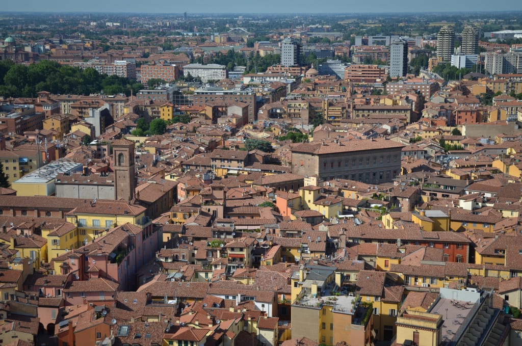 View from the Torre Asinelli of the city of Bologna -- all red roofs and twisted streets.