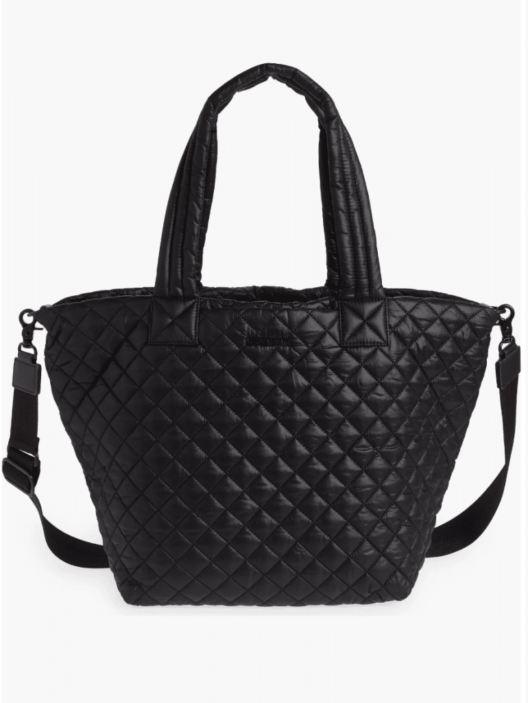 A black quilted tote bag with a crossbody strap.