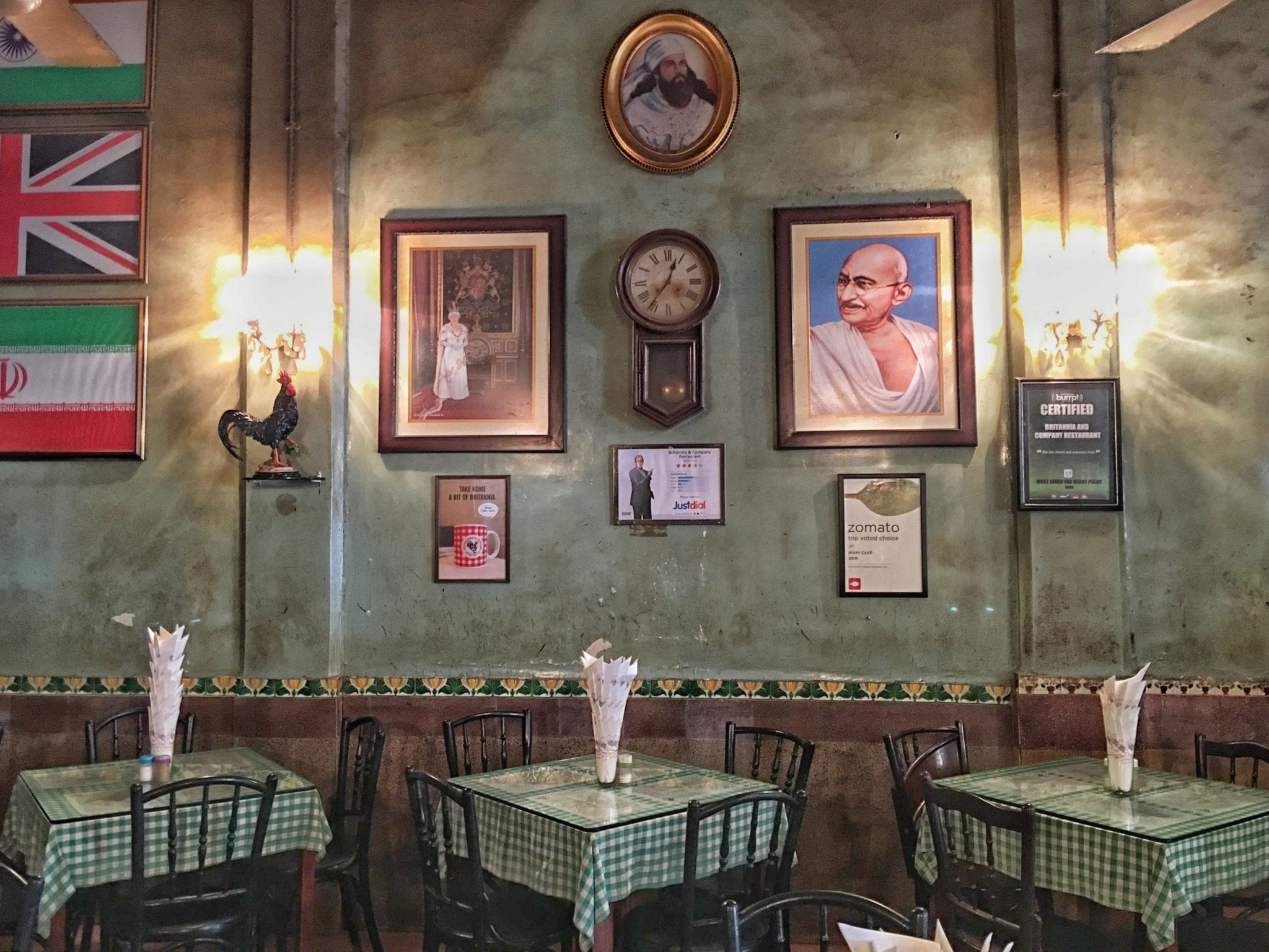 A cafe in Mumbai filled with pictures from India and Britain.