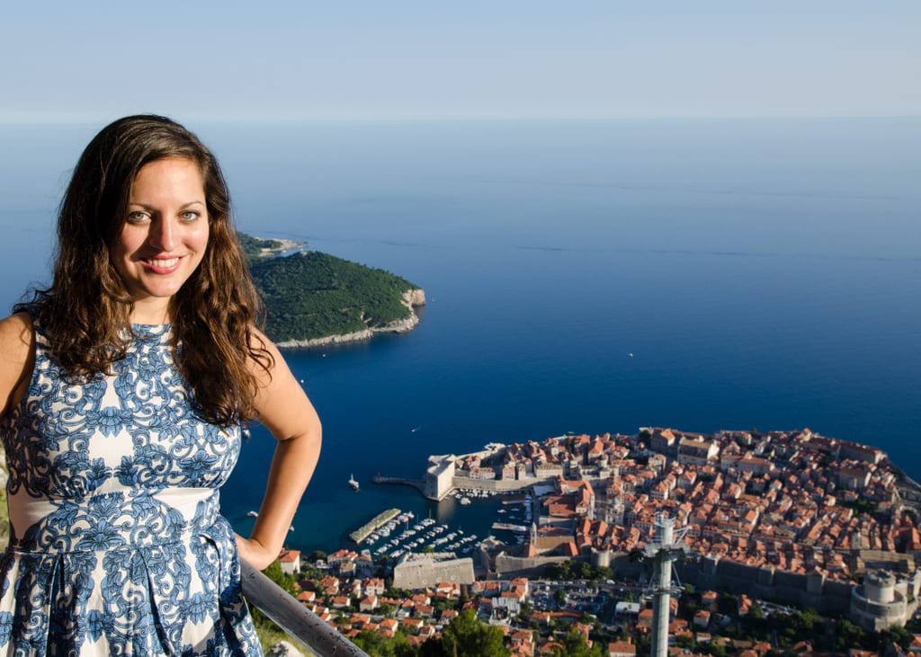 Kate standing with the old city of Dubrovnik in the background