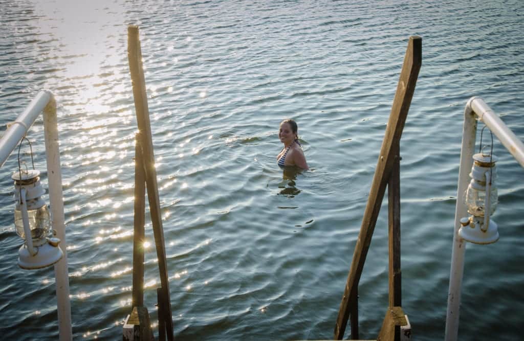 Kate swimming in a Finnish lake