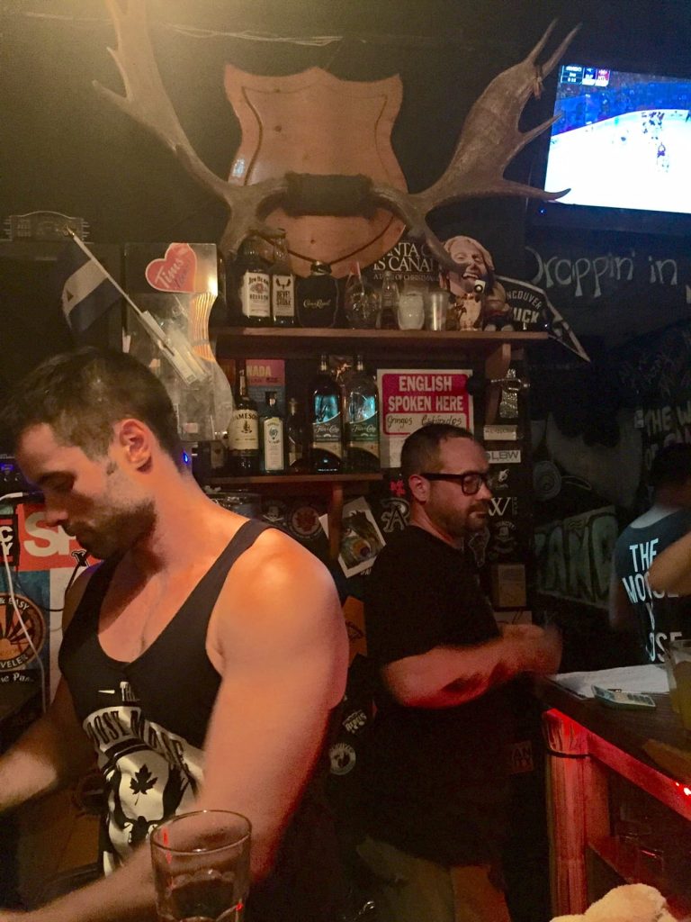 Bartenders pouring drinks in the Loose Moose, San Juan Del Sur