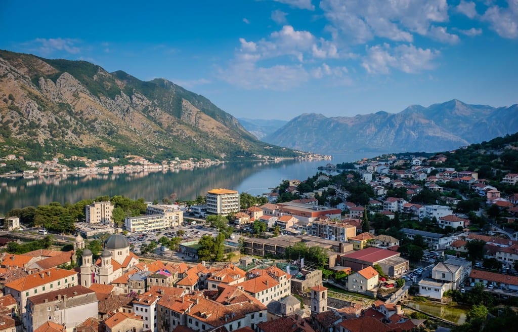 Morning at the Bay of Kotor, Montenegro, orange roofs and a bright blue sky