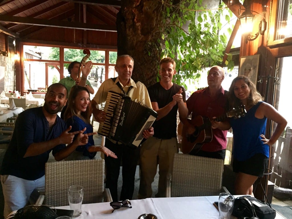 Kate, Kash, Leah, and Rob with a band of accordion players in Belgrade