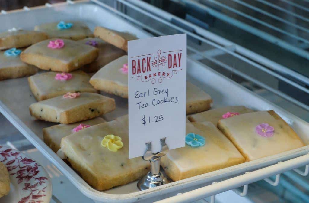 A pile of rectangular cookies with a label reading Back in the Day Bakery Earl Gray Cookies.