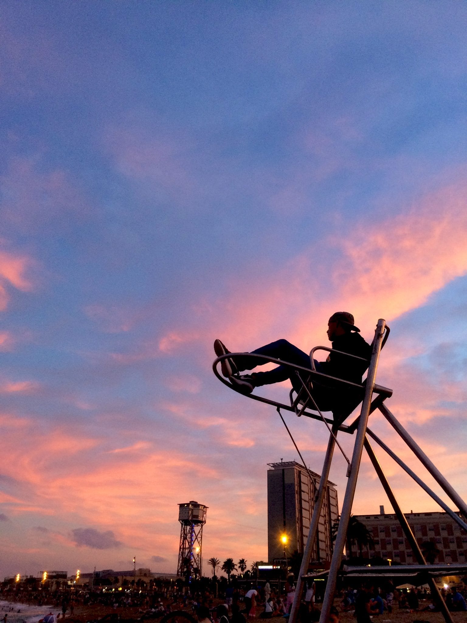 A lifeguard on a stand at a Barceloneta beach at dusk