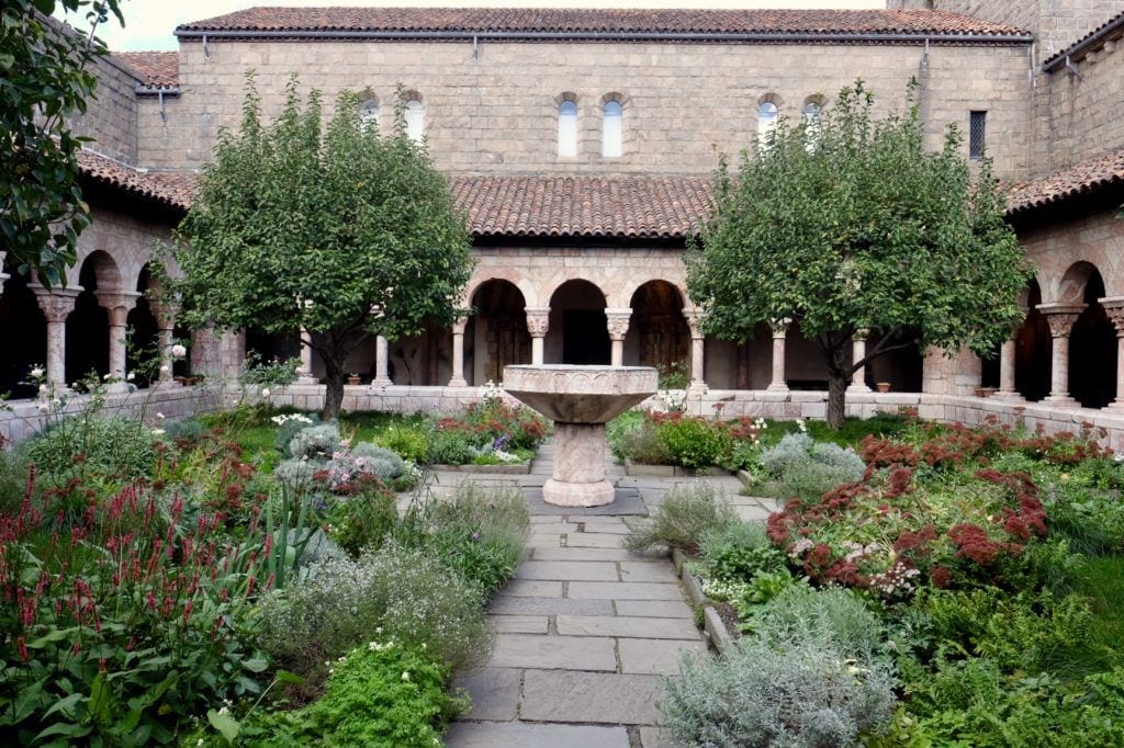 The medieval monastery of The Cloisters, with its garden courtyard.