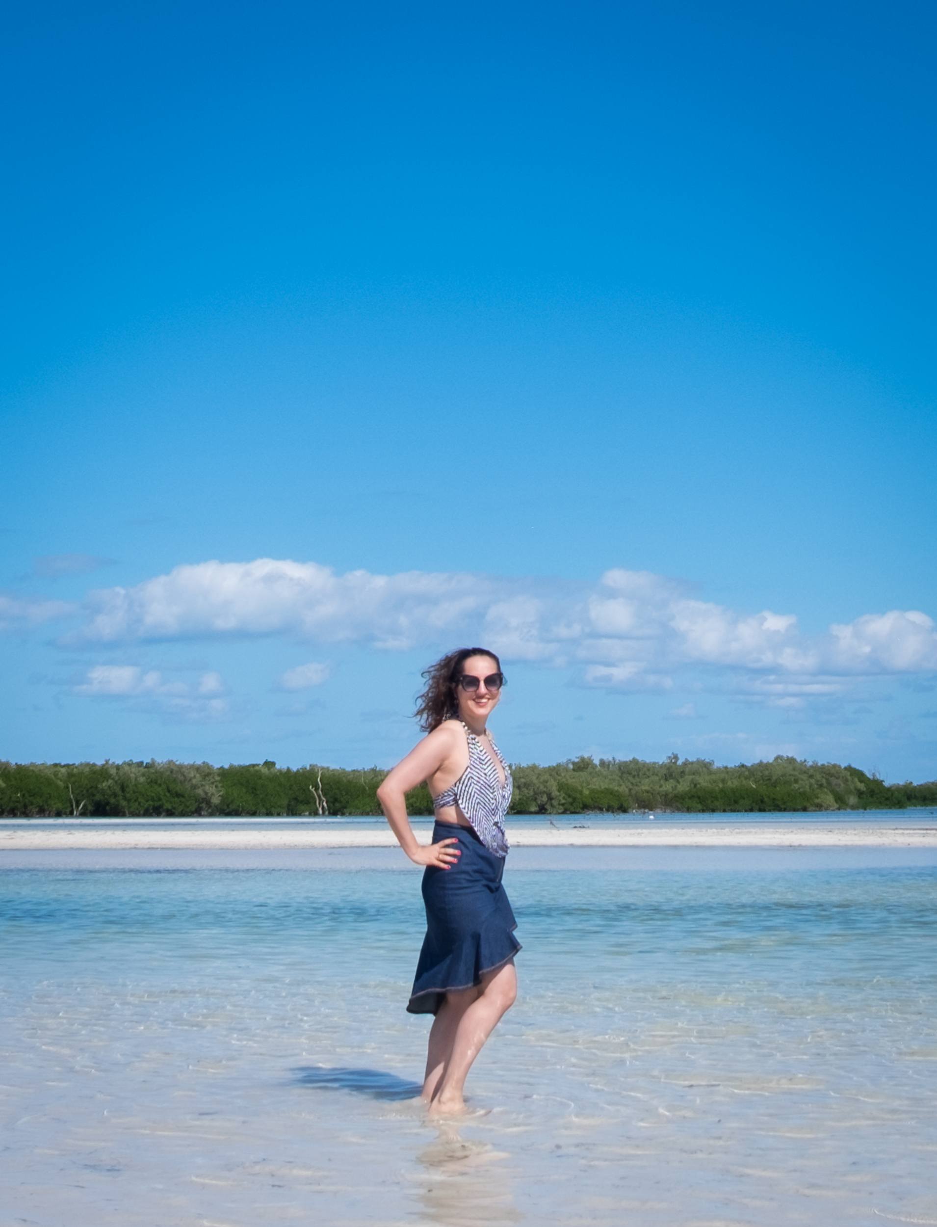 Kate standing in shallow water.