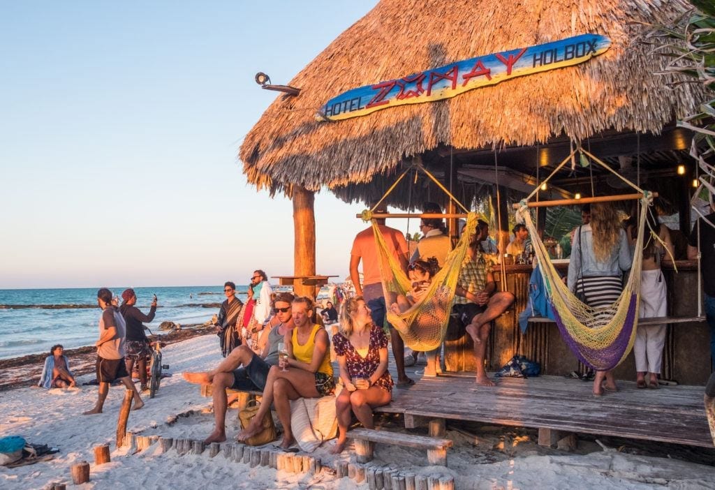 People getting ready to watch the sunset at Zomay bar on Holbox.