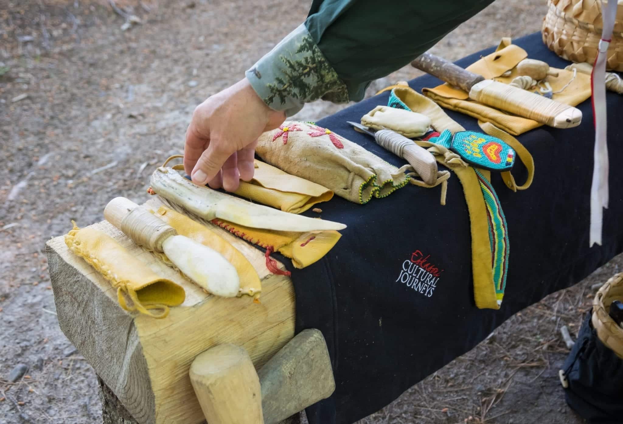 A long line of knives and weapons made from bone.