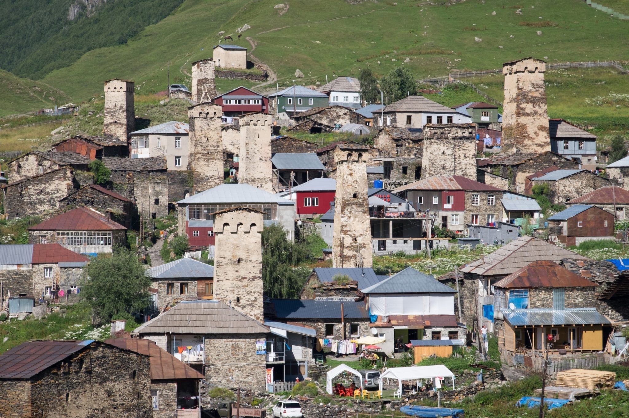 A close-up view of Ushguli's stone towers and village cafes.