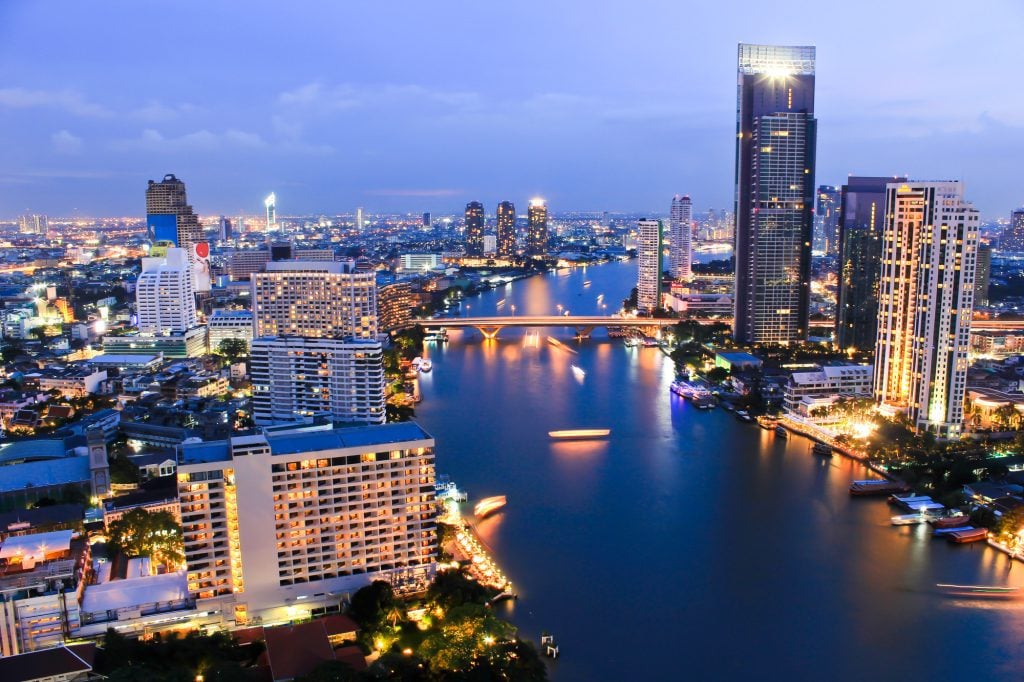 The Bangkok City Skyline with the Chao Phraya River running through it.