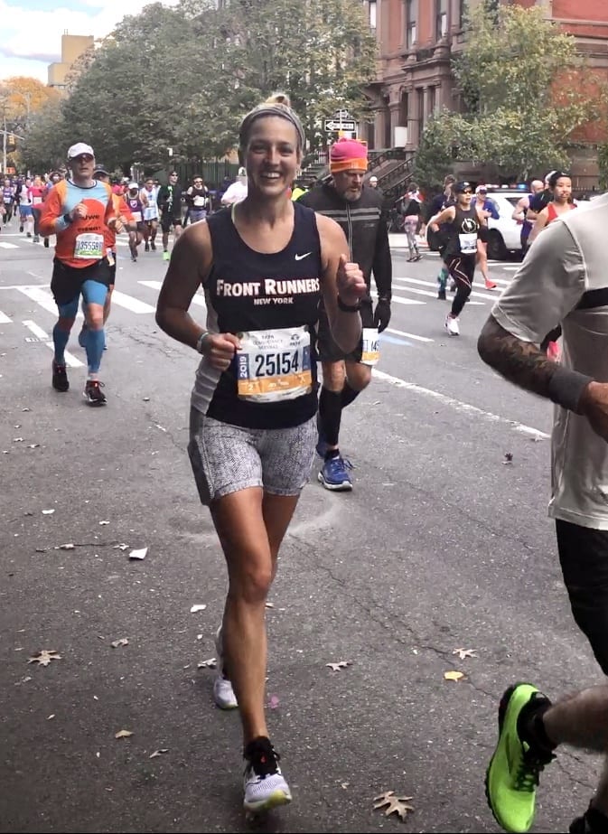 Kate's sister Sarah runs the New York marathon with a big smile on her face.