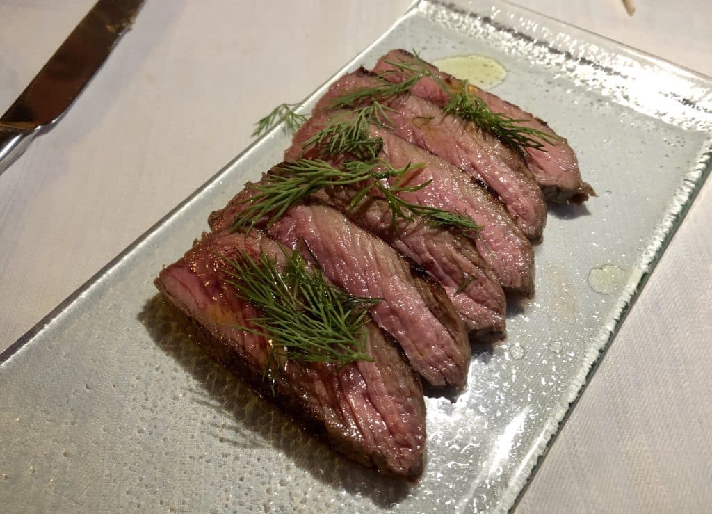 Tagliate di Manzo, thin sliced beef filet, here topped with dill.