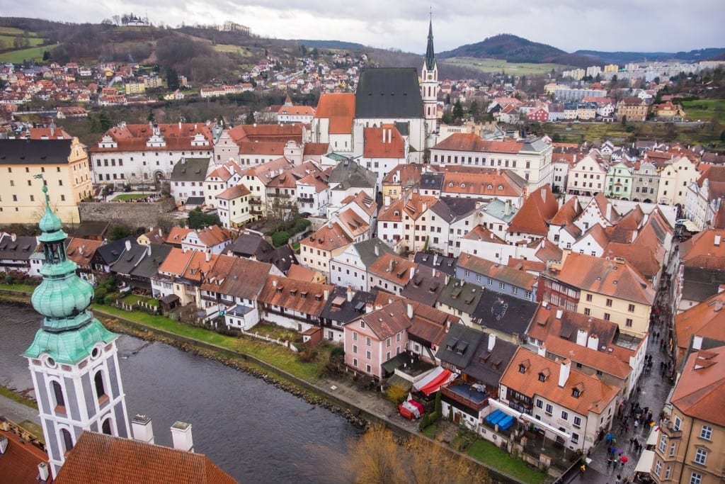 A view of the church towers and orange-roofed buildings of Cesky Krumlov