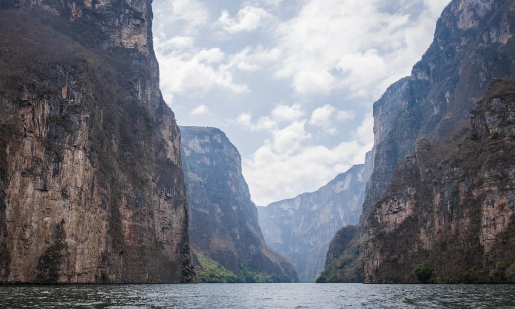 One final image of the still river between the canyon walls.