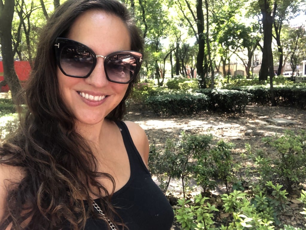 Kate in sunglasses in Parque Mexico in Mexico City