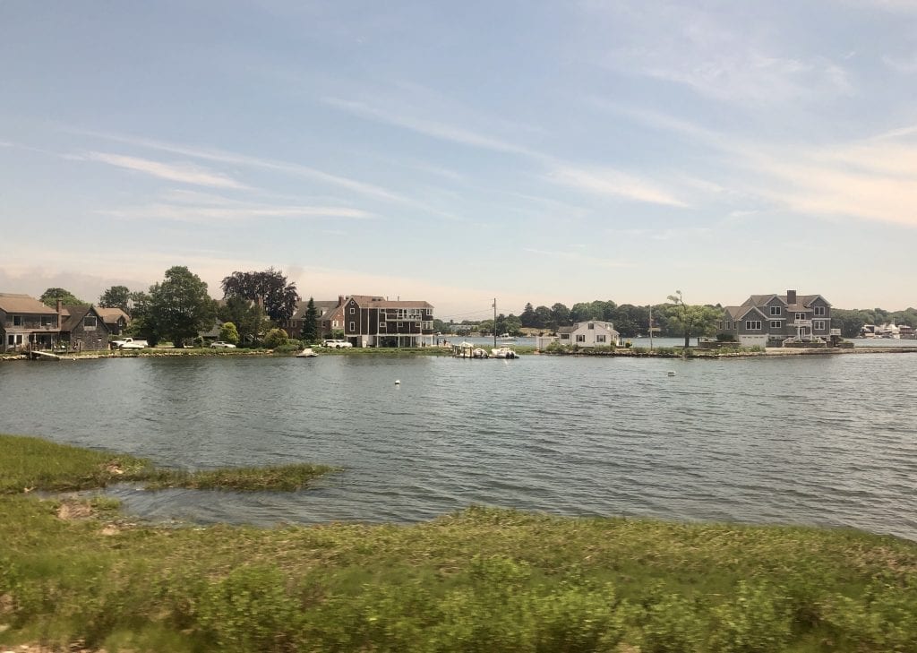 Houses perched on the water on the Connecticut, coastline.