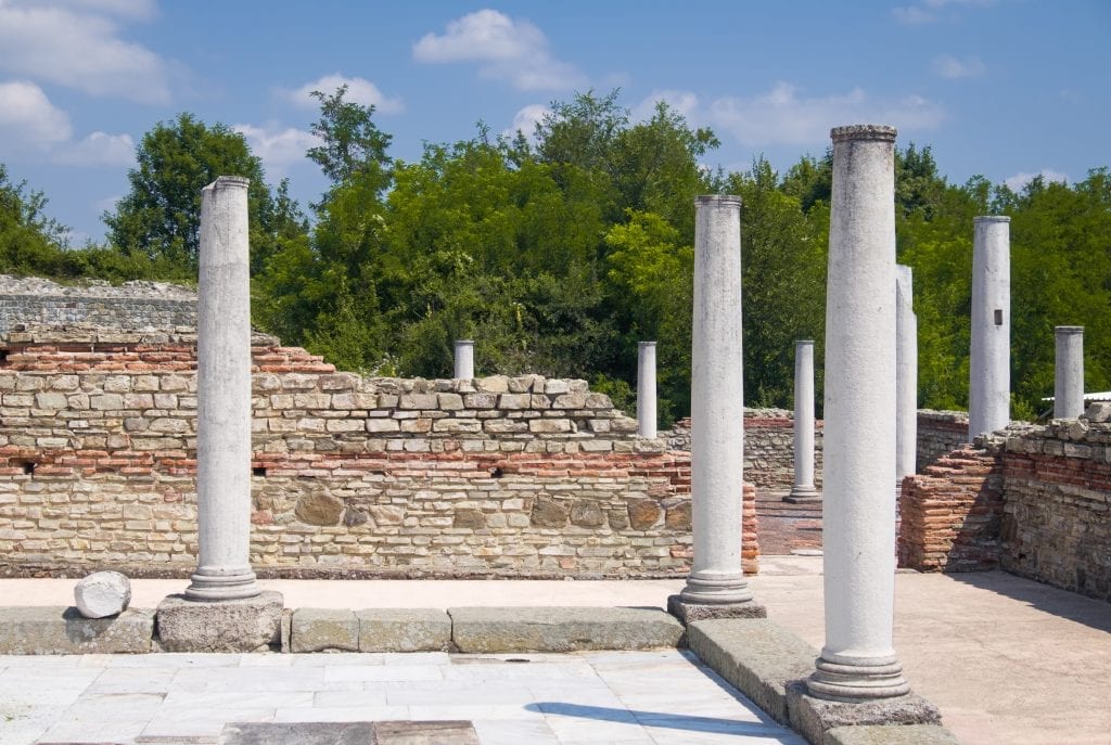 Tall columns at a Roman ruins site.