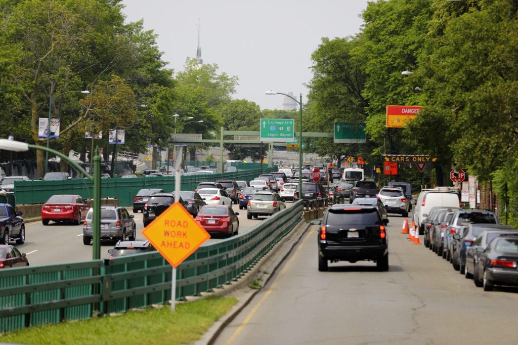 Cars on the highway that is Storrow Drive. You see signs that say DANGER! CARS ONLY!