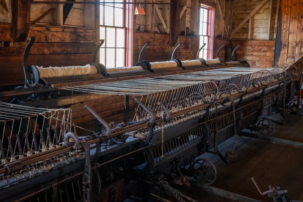 Old-fashioned looms from the 19th century.