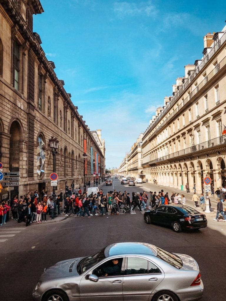 A view of Rue de Rivoli in Paris with the North Wing of the Louvre