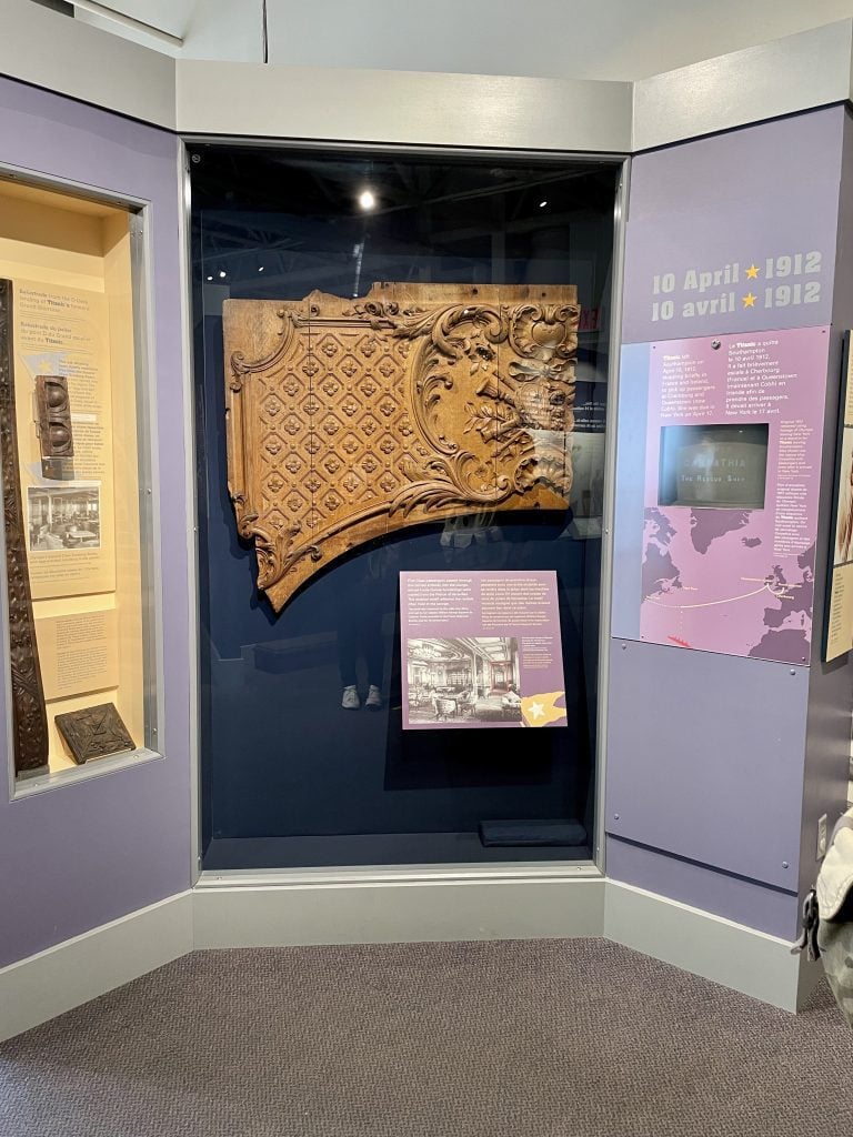 A section of ornate carved wood that used to be an entryway on the Titanic.