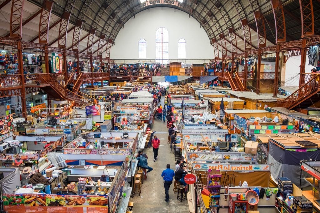 A giant warehouse-looking market with tons of food stalls and mini restaurants.