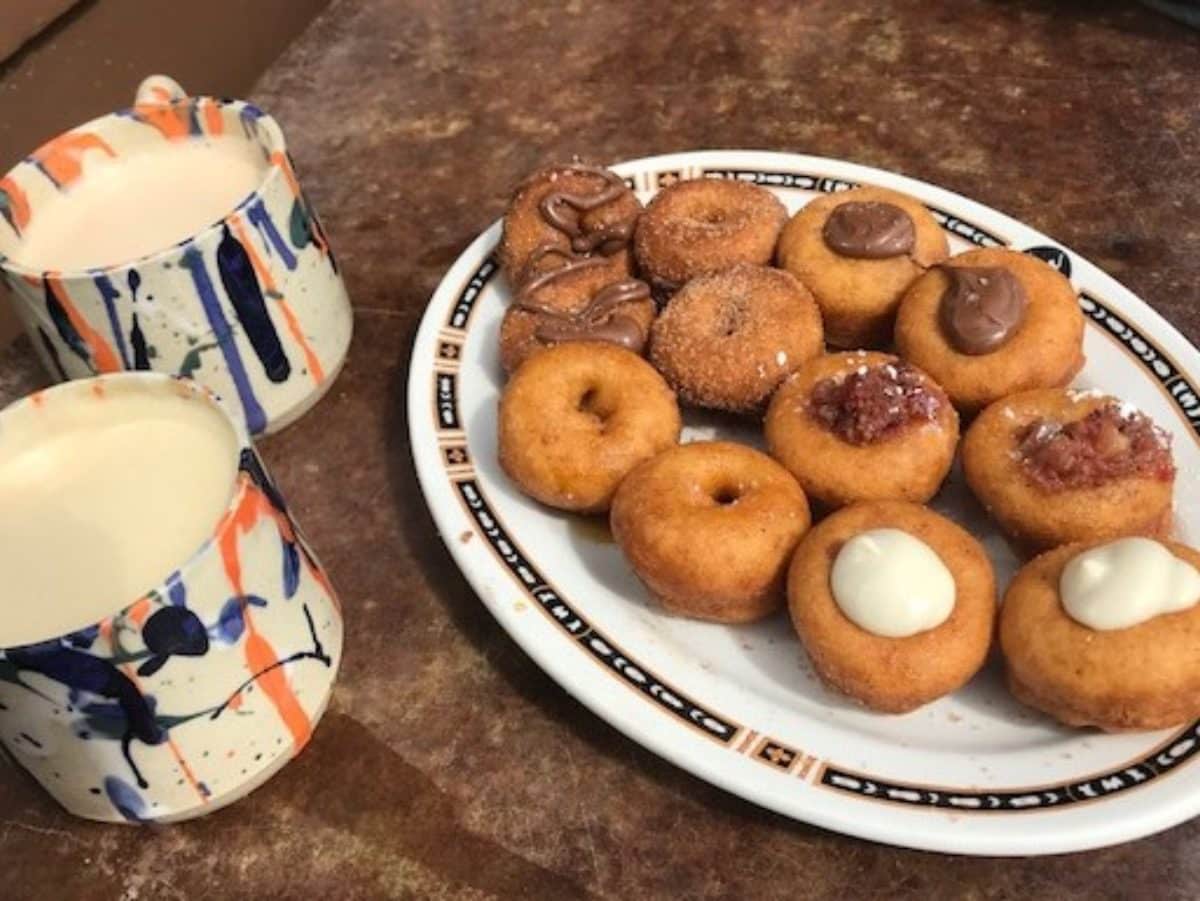 A plate of stuffed donuts
