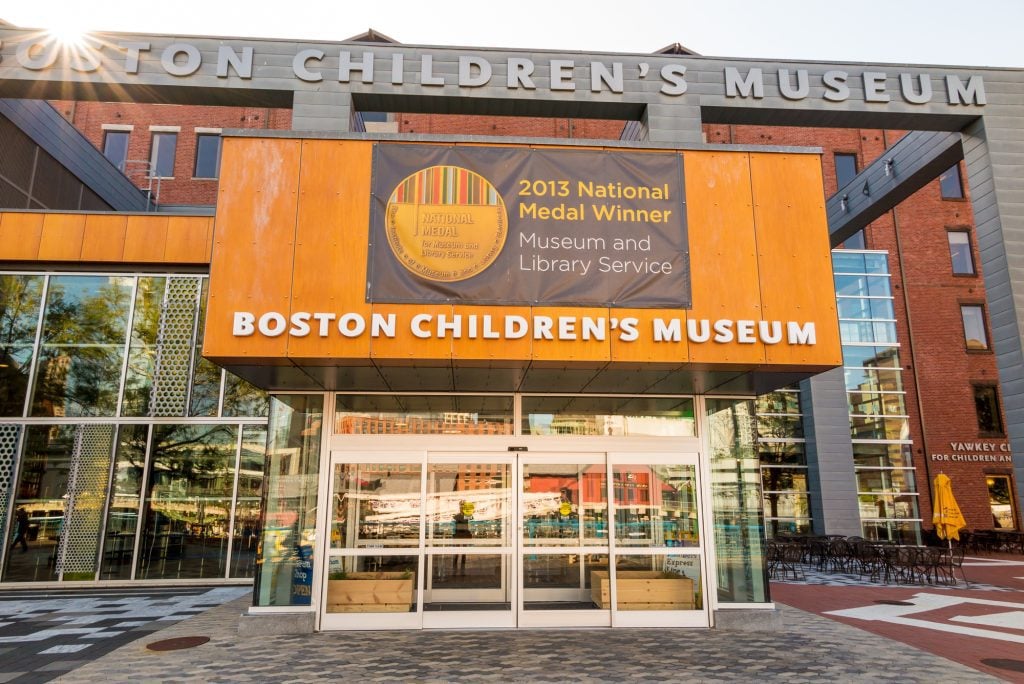 The exterior of the Boston Children's Museum, a building of mostly glass.