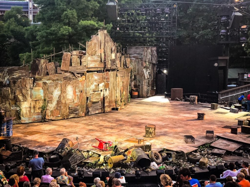 An audience in front of a play set