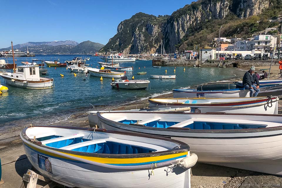 Boats on the sand and in the water of Capri