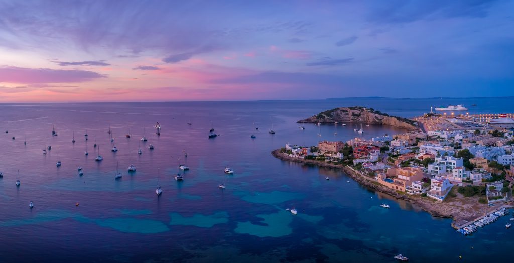 Aerial view over Ibiza and the sea at sunrise