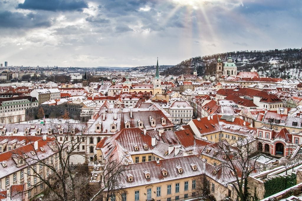The gorgeous Bohemian buildings of Prague dusted with a fresh layer of snow.