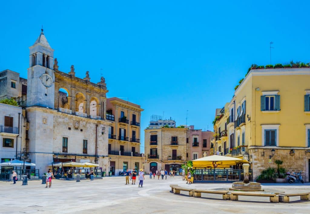 A quiet piazza in Bari, a fountain in the middle.