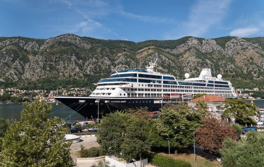 An enormous cruise ship docking near the old town of Kotor.