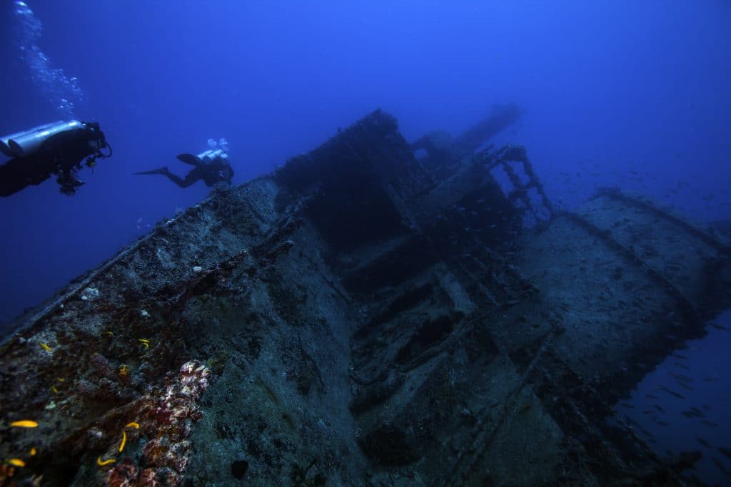 A diver examining a giant shipwreck in Florida.