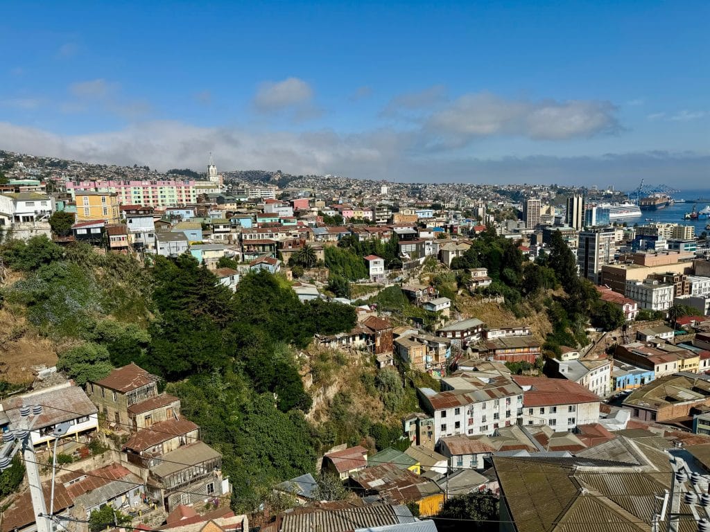A view of colorful buildings on a steep hillside in Valparaiso.