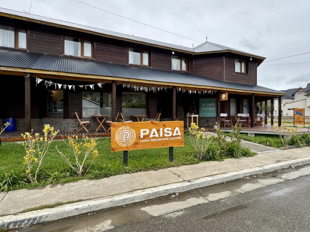 A big cabin in El Chalten reading "Paisa HighMountain Coffee" on the sign.