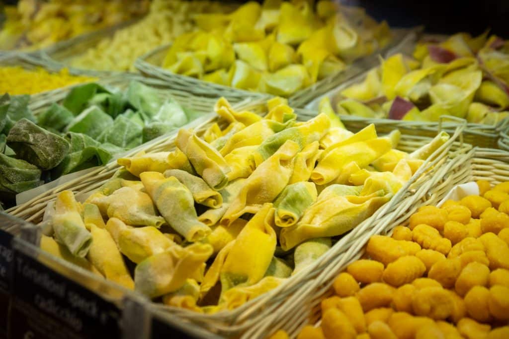 Trays of freshly made stuffed pasta in Italy.