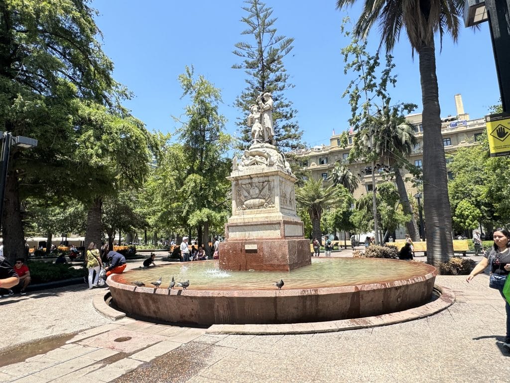 A fountain in a busy square in Santiago, Chile.