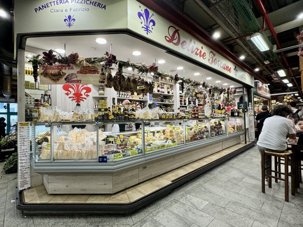 An enormous cheese shop with a counter in Florence's central market.